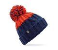 Two-tone beanie with red top and navy bottom on a white background