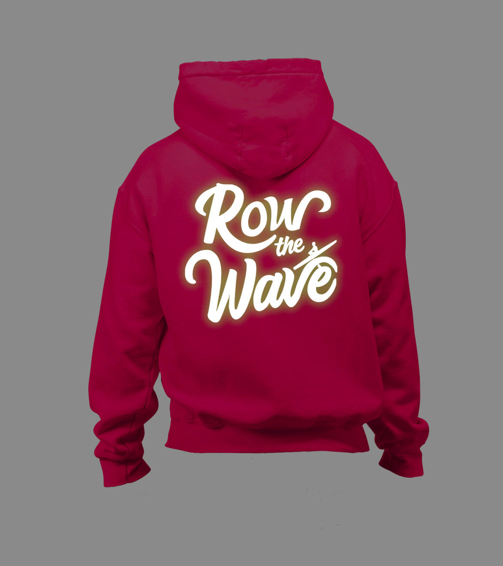 Pink rowing hoodie with 'Row the Wave' text on the back glowing in the dark